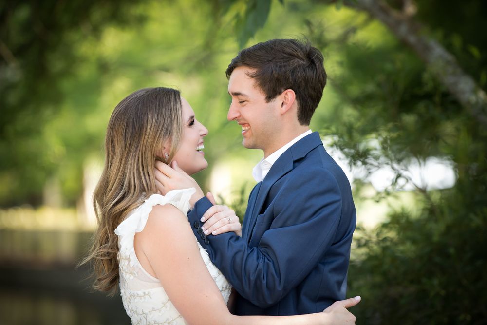 Romantic outdoor wedding photography sequence with natural greenery backdrop.
