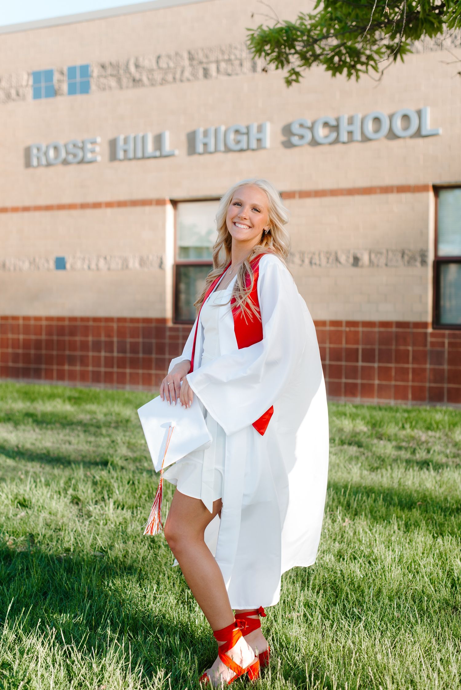 High school senior pictures with cap and gown at Rose Hill in Wichita KS Kansas