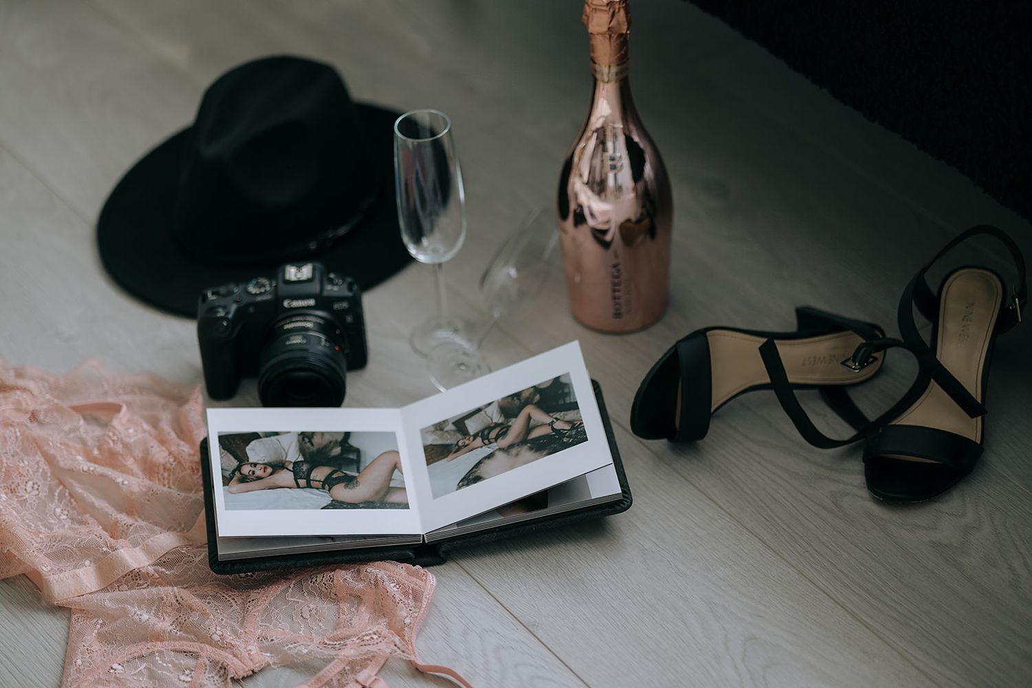 Album, camera, champagne, lingerie, high heels. Luxury Boudoir Photographer Barrie, ON