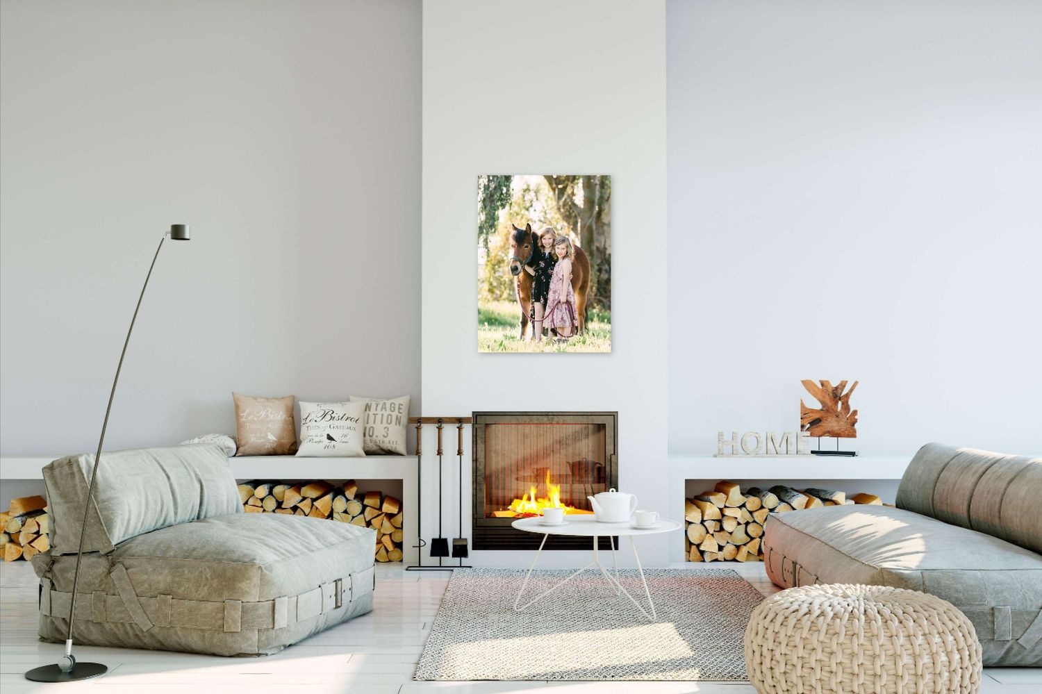 Cozy contemporary living room with horse artwork above fireplace and comfortable seating.