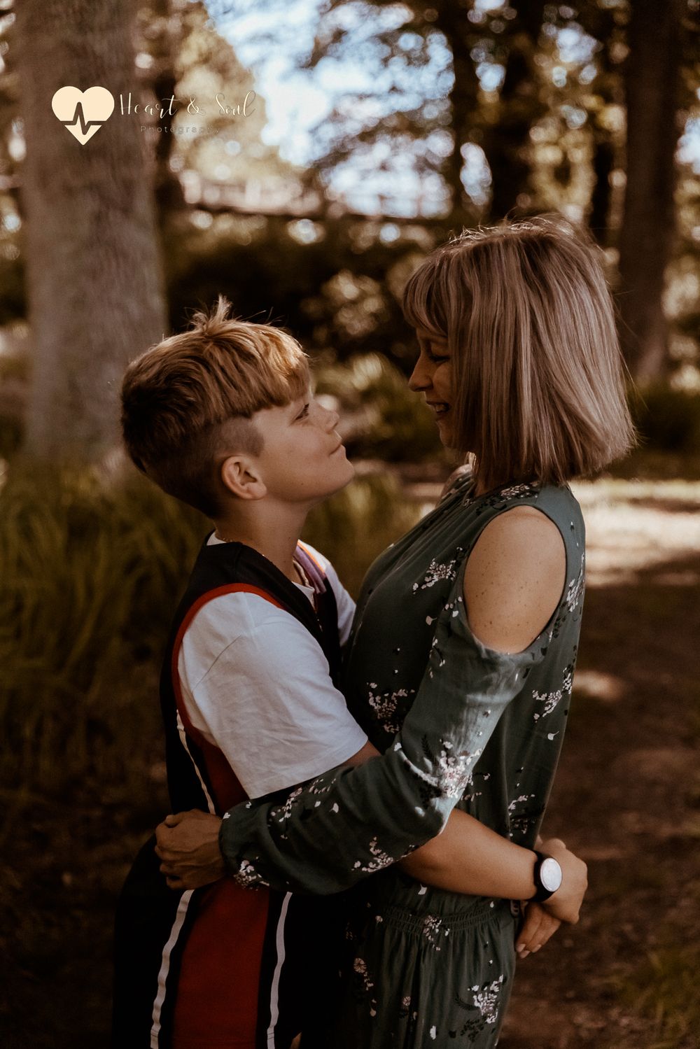 lady and boy hugging