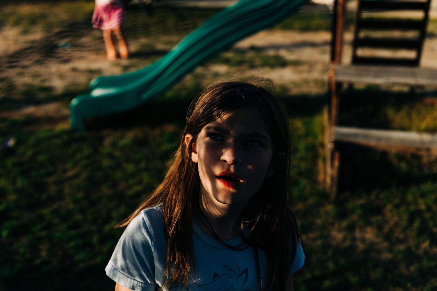 Low key image of young girl