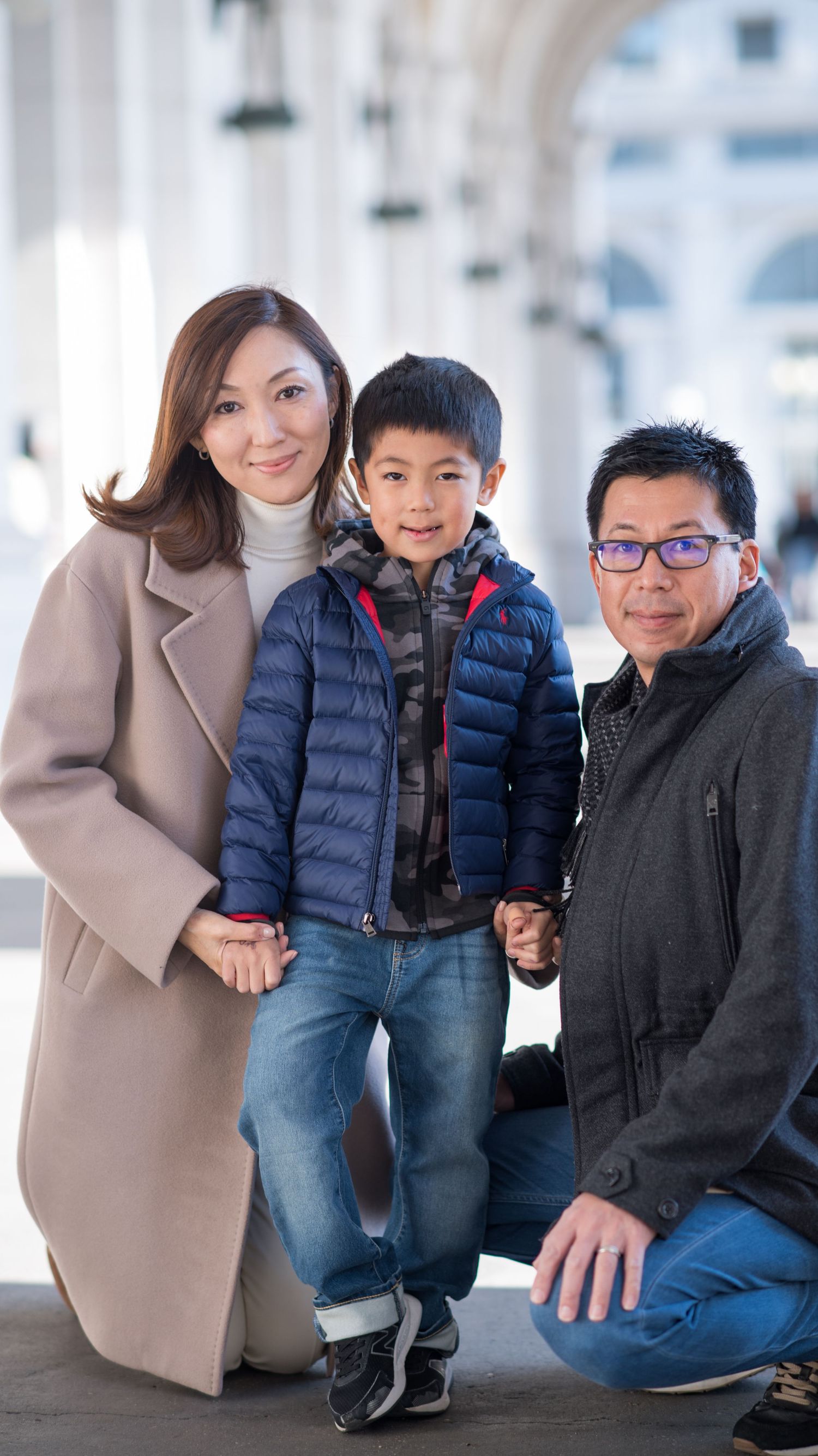 DMV Black Female Photographer captures asian family at union station