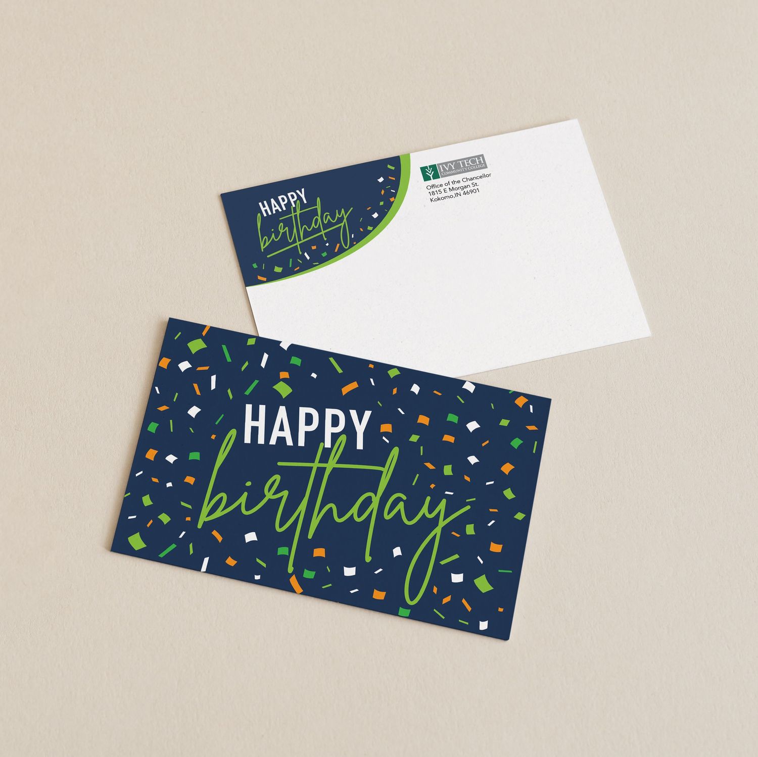 Navy blue birthday card design with colorful confetti pattern and script lettering.