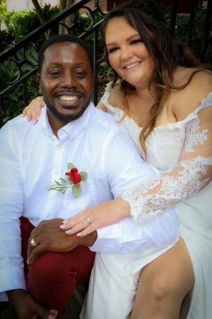 A romantic outdoor wedding photoshoot with the couple sharing loving moments together.