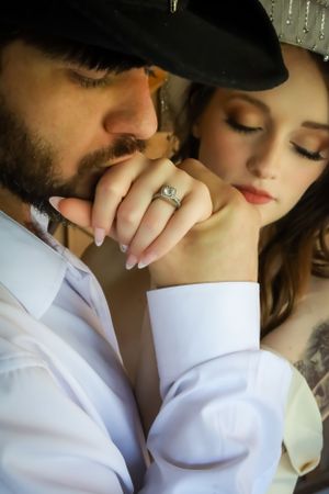 An intimate close-up moment between newlyweds during their wedding photoshoot.