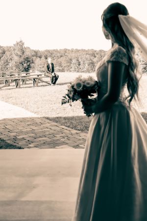 A vintage-style wedding portrait sequence captured in black and white tones outdoors.