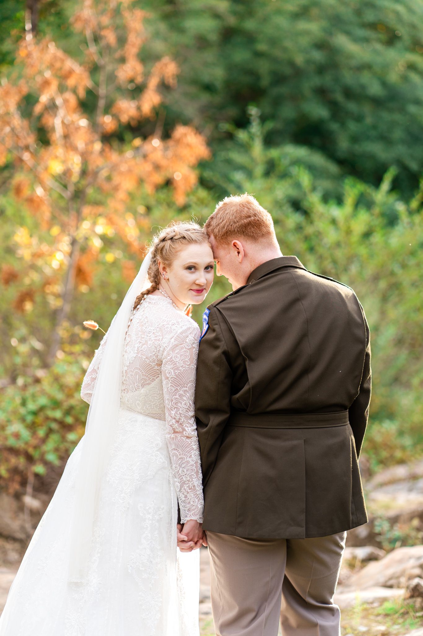 groom nuzzles into bride
