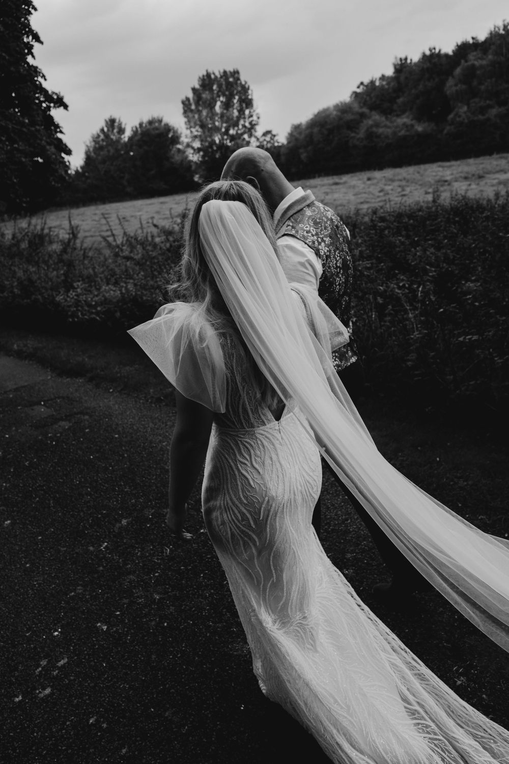 unposed black and white wedding photograph