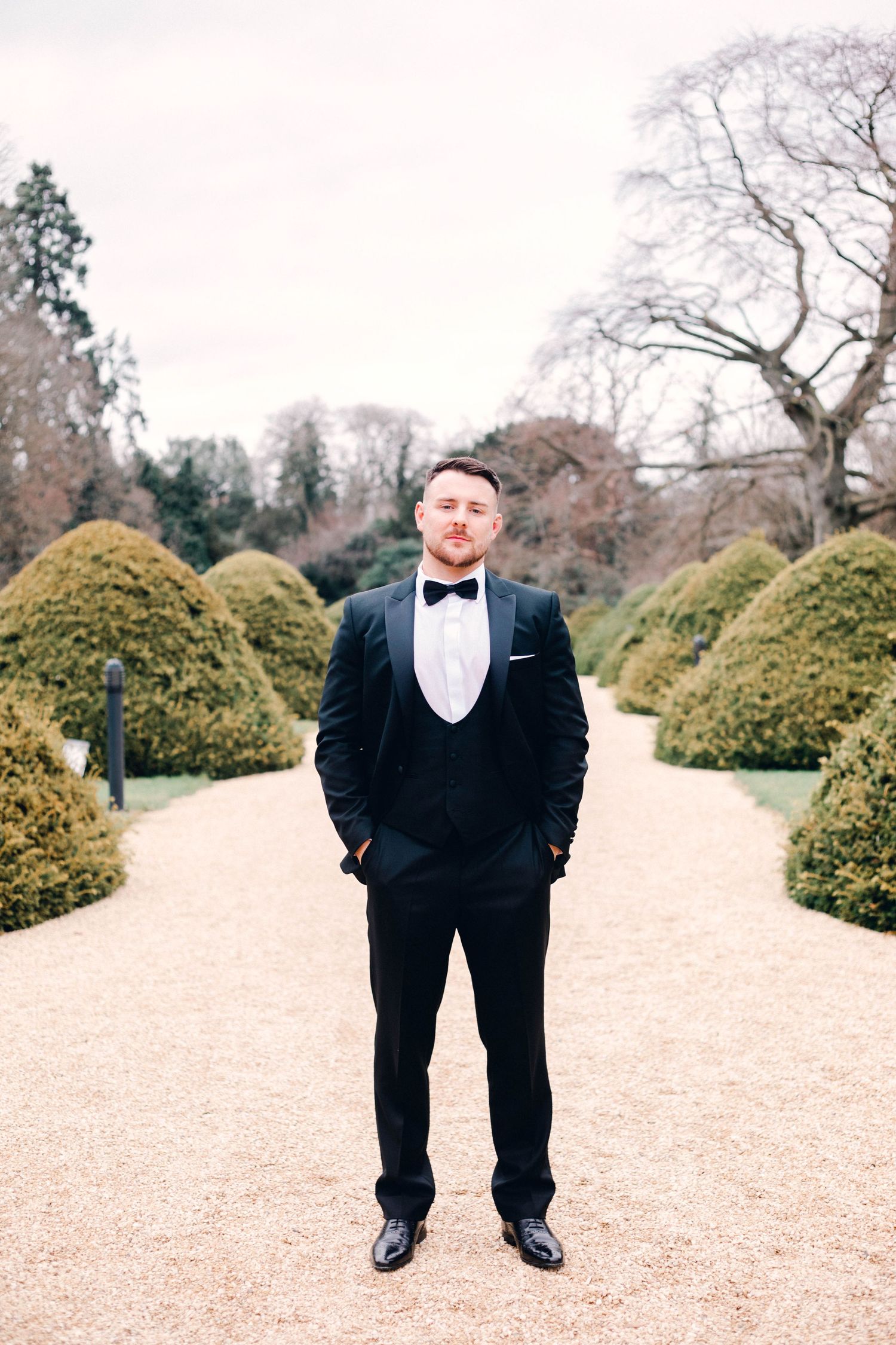 the gentleman of the hour classic black tie groom suit