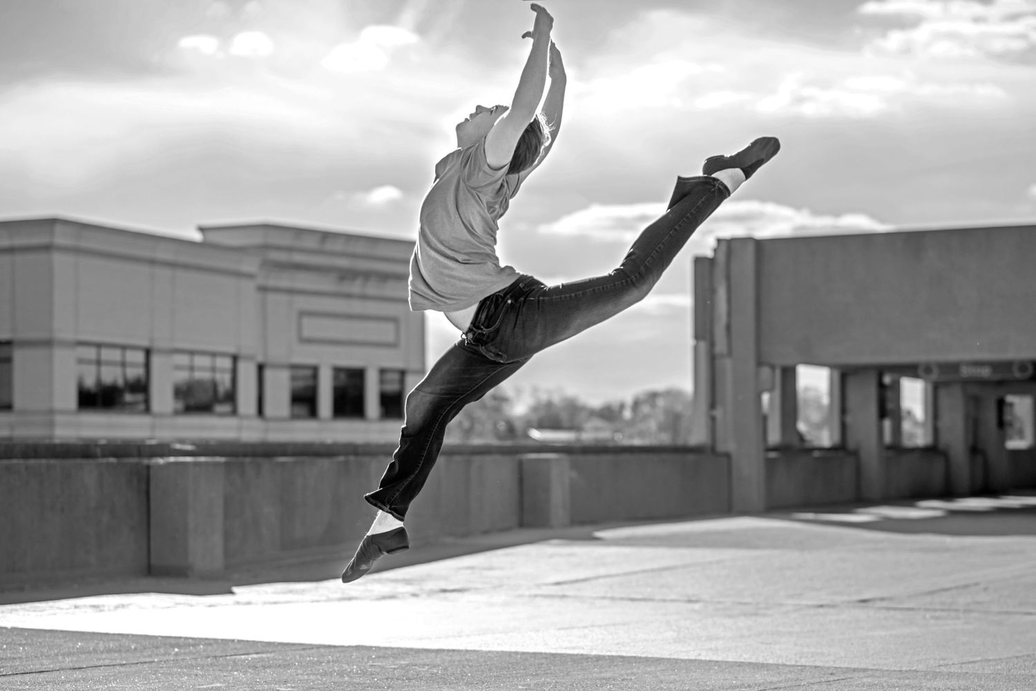 Dancing on the parking garage urban explorer Aurora session photo