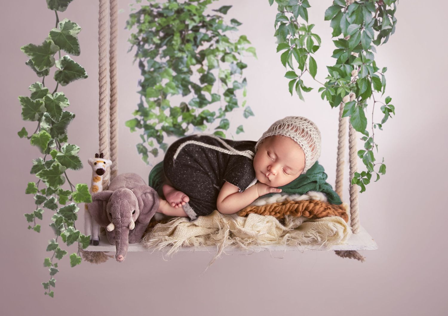 jungle theme baby boy on swing newborn child