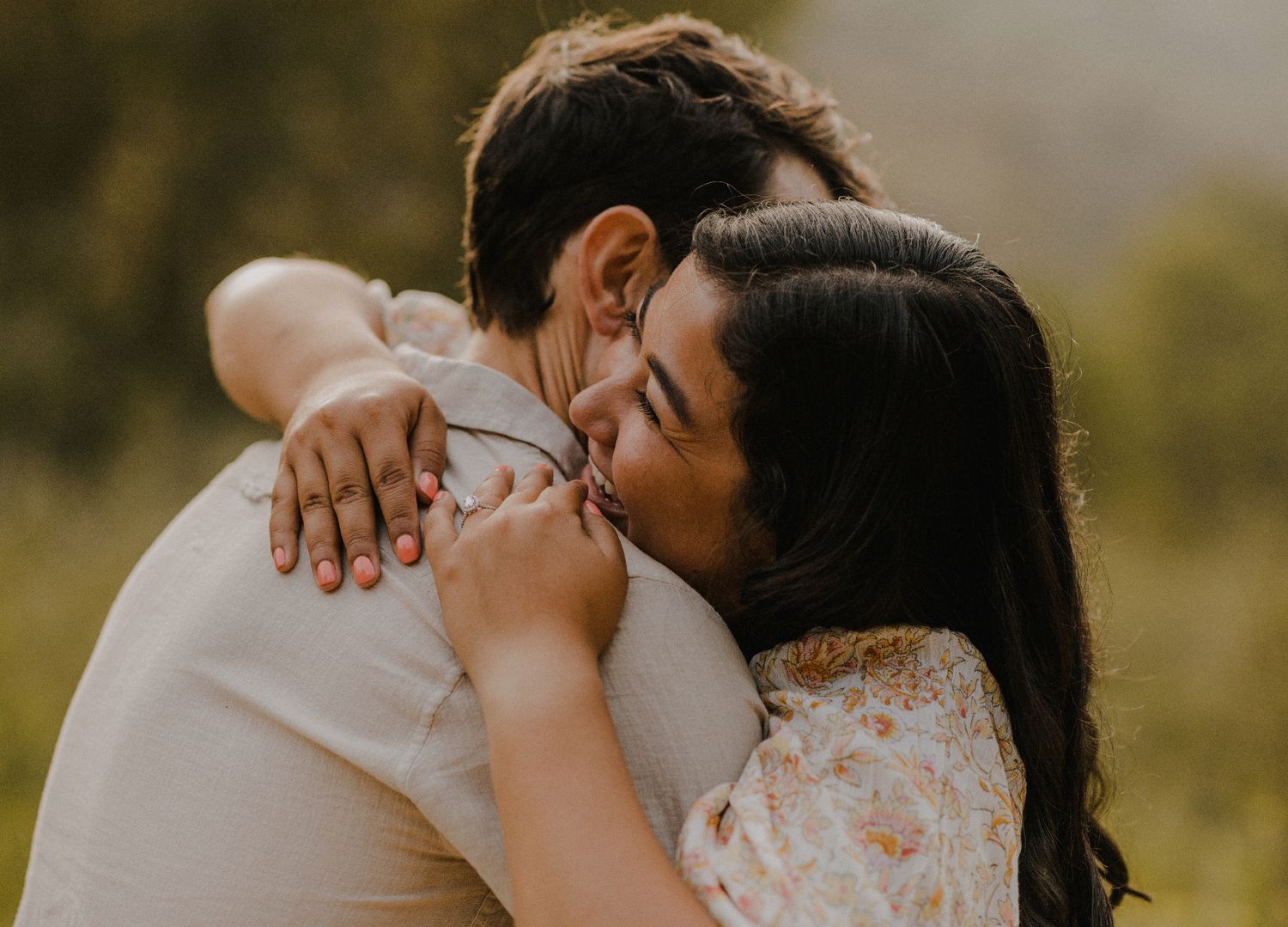 E. Noelle Photography couple engagement in the Los Angeles Malibu hills laughing and hugging