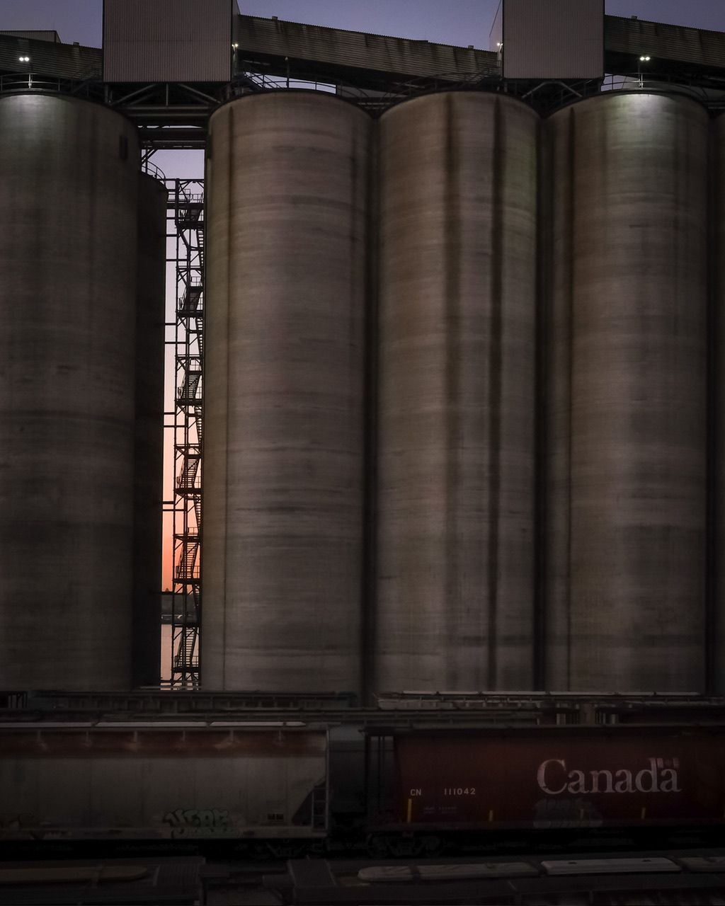 Lonsdale Quay grain silos at night with lights, North Vancouver landmark photography