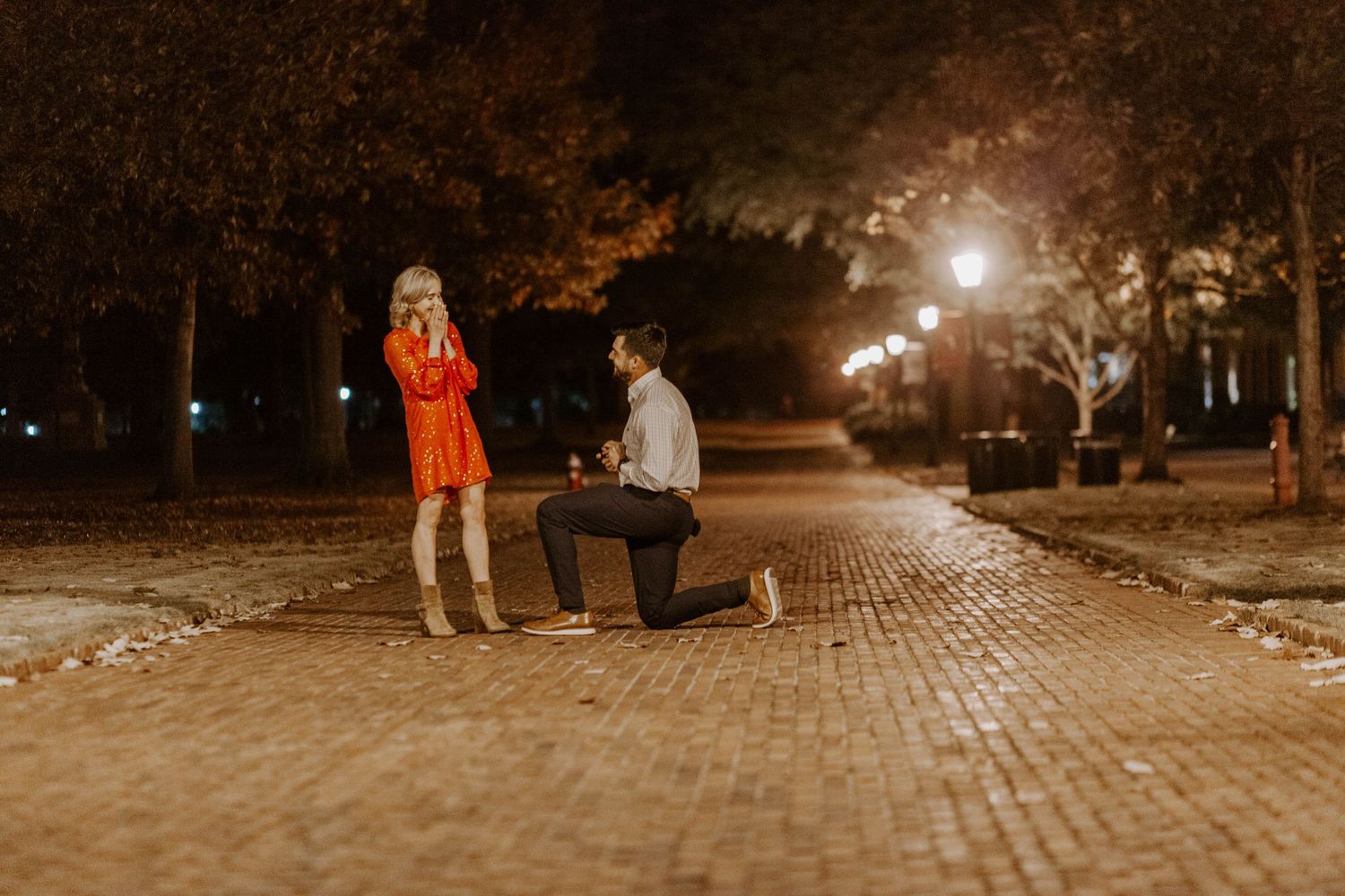 Man surprises his girlfriend with a proposal late at night.
