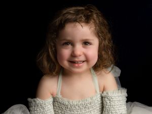 Portrait and fine art photography of child smiling