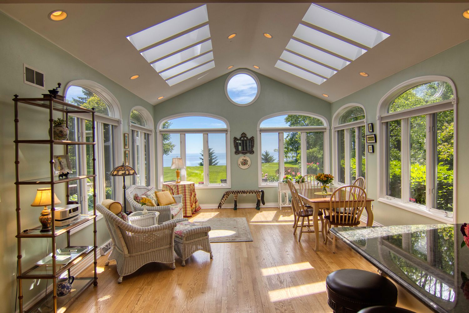 Sunroom interior with skylights and panoramic windows, Wisconsin real estate photography