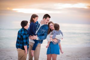 fun family portrait session at sunset on Panama City Beach Florida