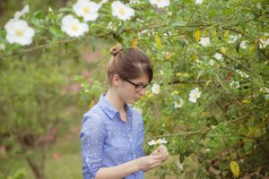 senior surrounded by flowers senior portraits Panama City Florida