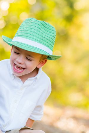 boy laughing during kid photo session in Panama City Florida