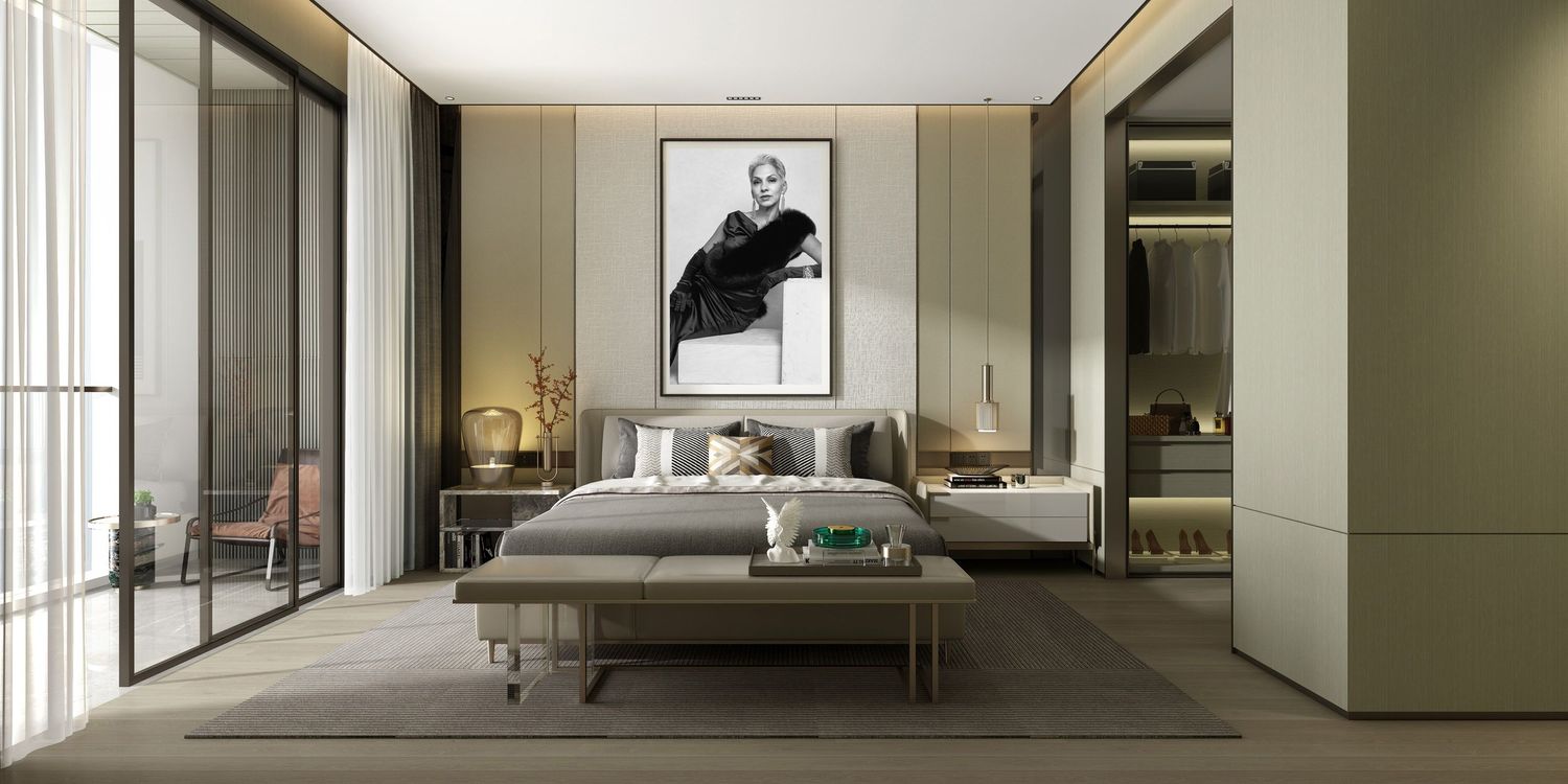 Modern luxury bedroom with neutral tones, large bed, and black and white fashion portrait wall art.