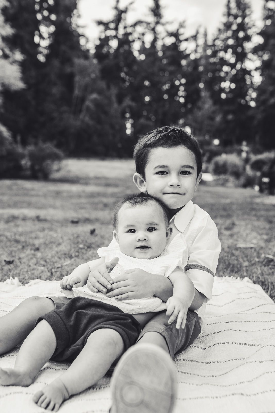 Black and white photo of brother and sister together in Kirkland