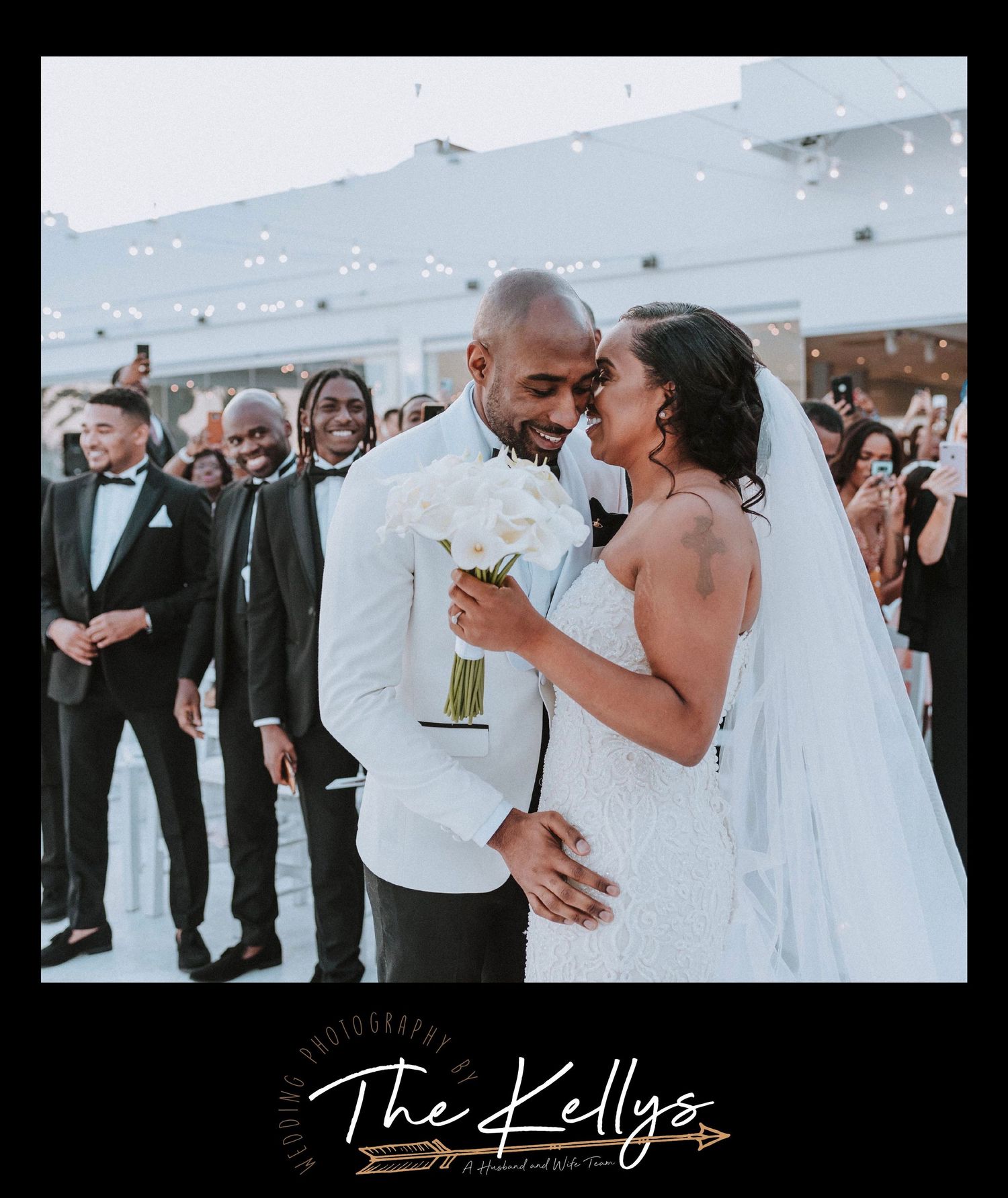 A joyous wedding couple sharing an intimate moment during their reception.
