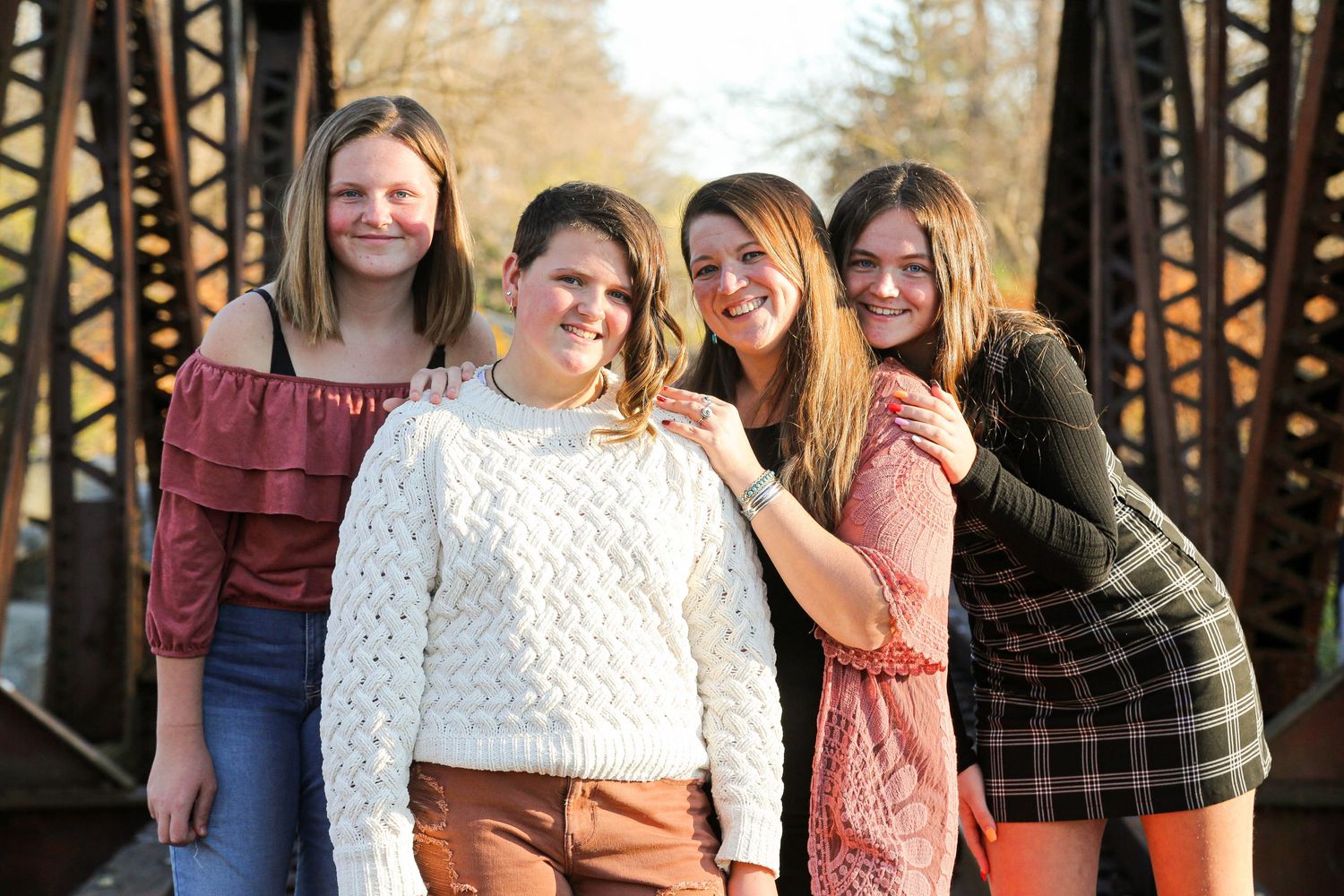 daughters and mom portrait on bridge in Lansing, NY at Meyers Park