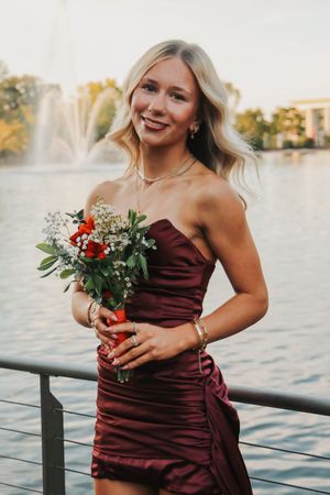 Homecoming photo in front of water