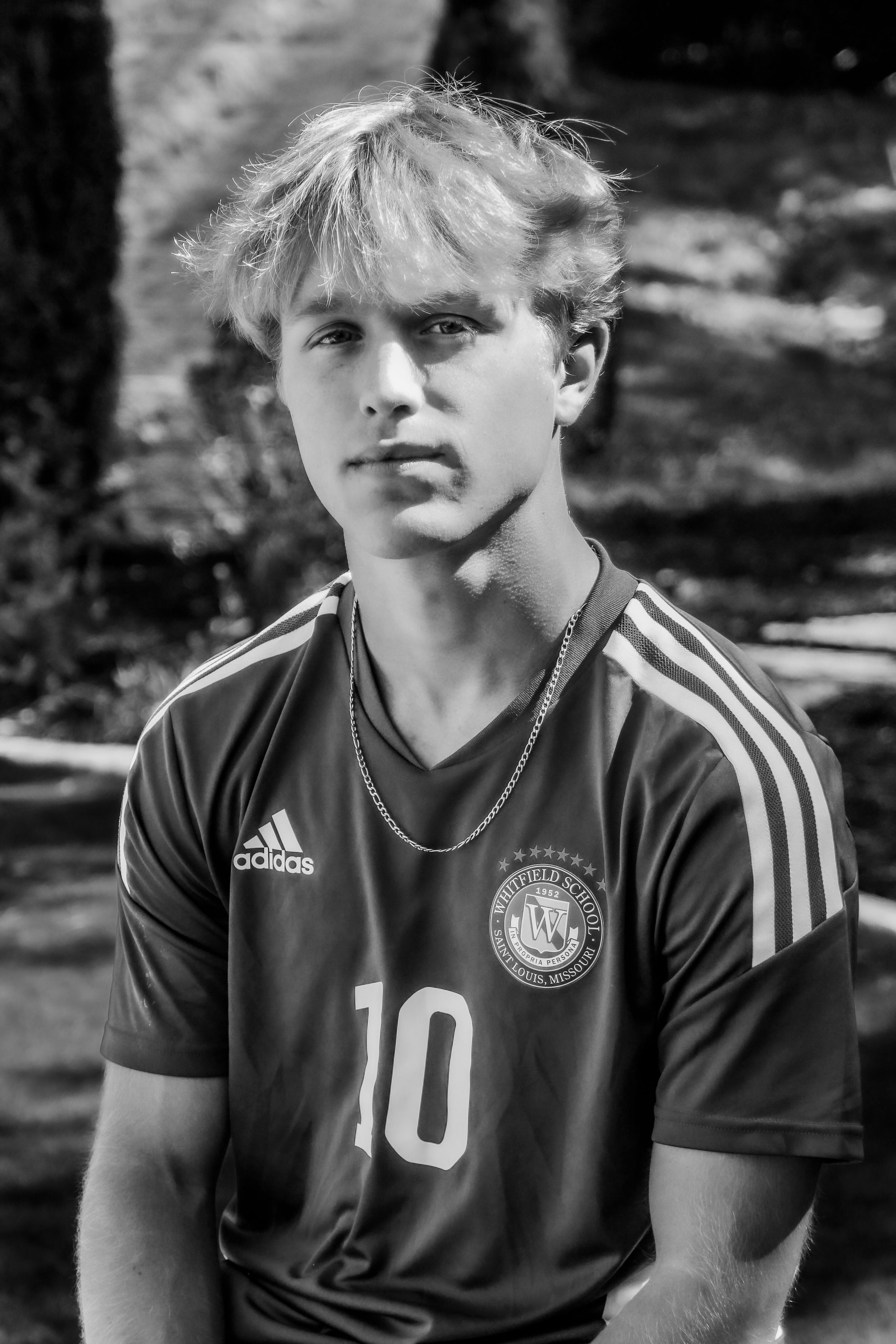 Senior boy in soccer jersey