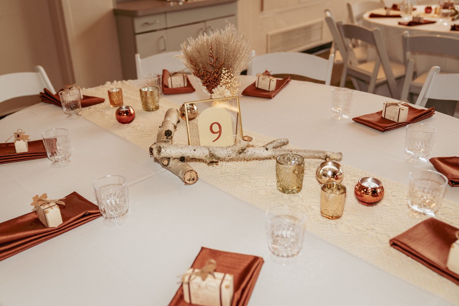 Elegant reception table with dried florals and candles, fall PDX wedding.