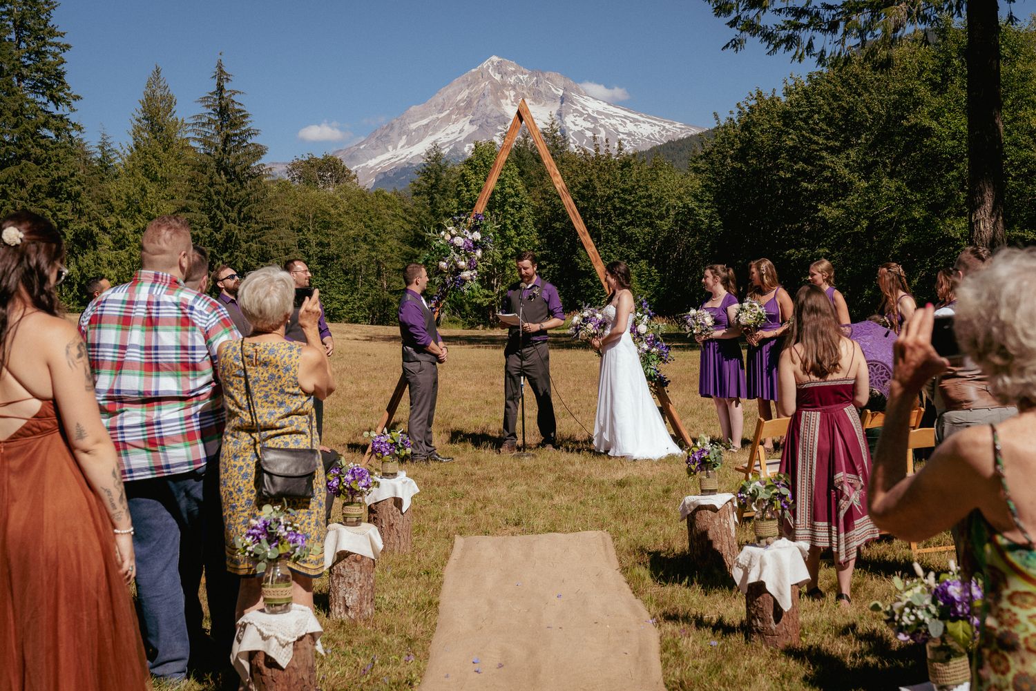 Forest wedding under Mt. Hood, ceremony with mountain backdrop in Oregon.