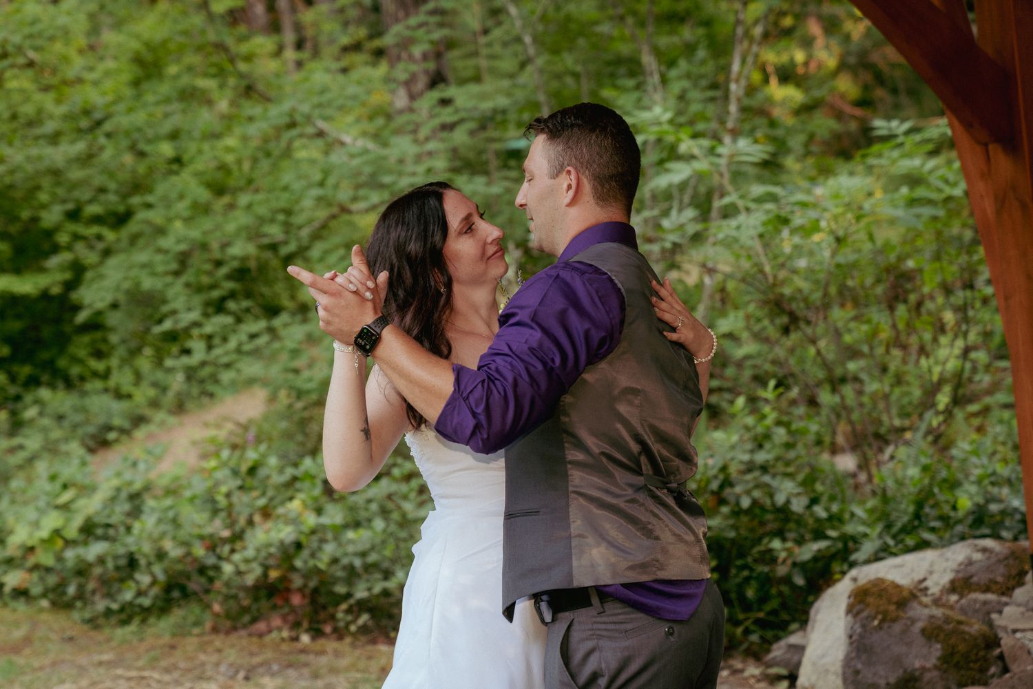 Couple dances in forest clearing, backyard PNW reception