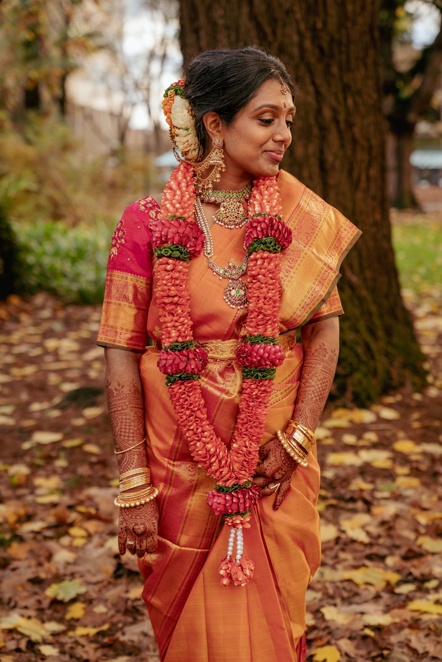 Indian bride in vibrant saree, PNW multicultural wedding vibes.