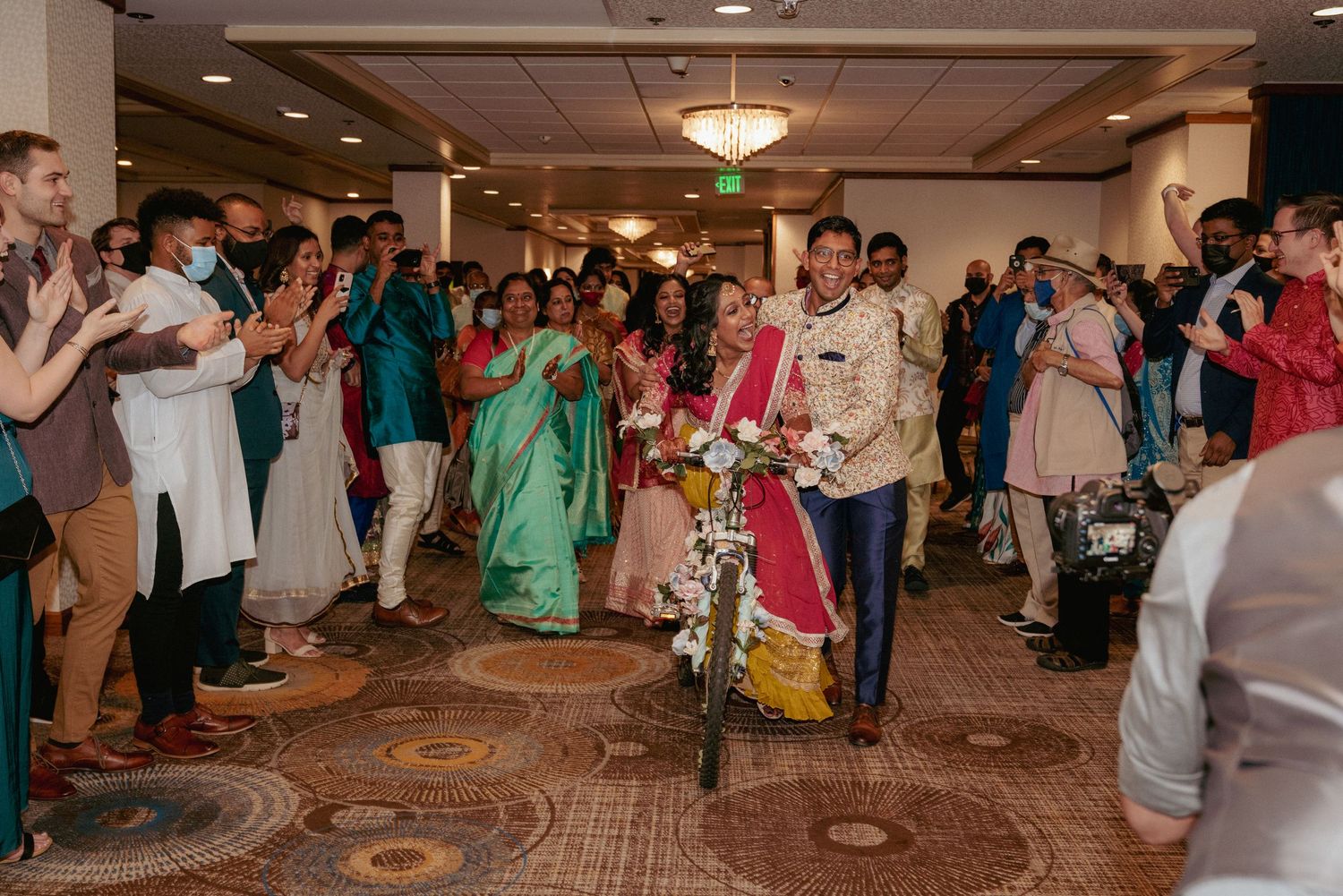 Traditional Indian wedding reception with colorful attire, Portland.