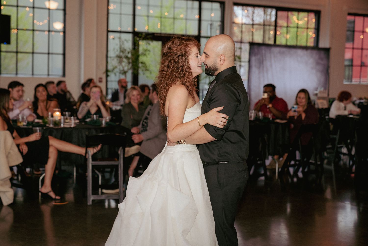 Bride and groom's first dance in industrial Portland venue.