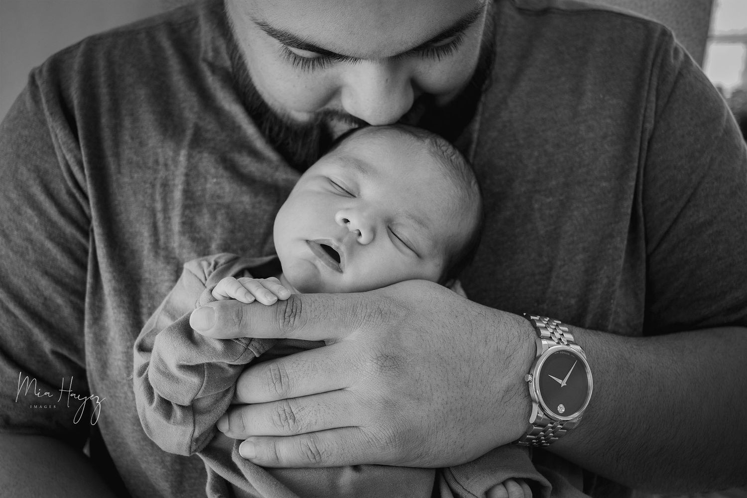 Intimate black and white portrait series showing tender emotional moments.