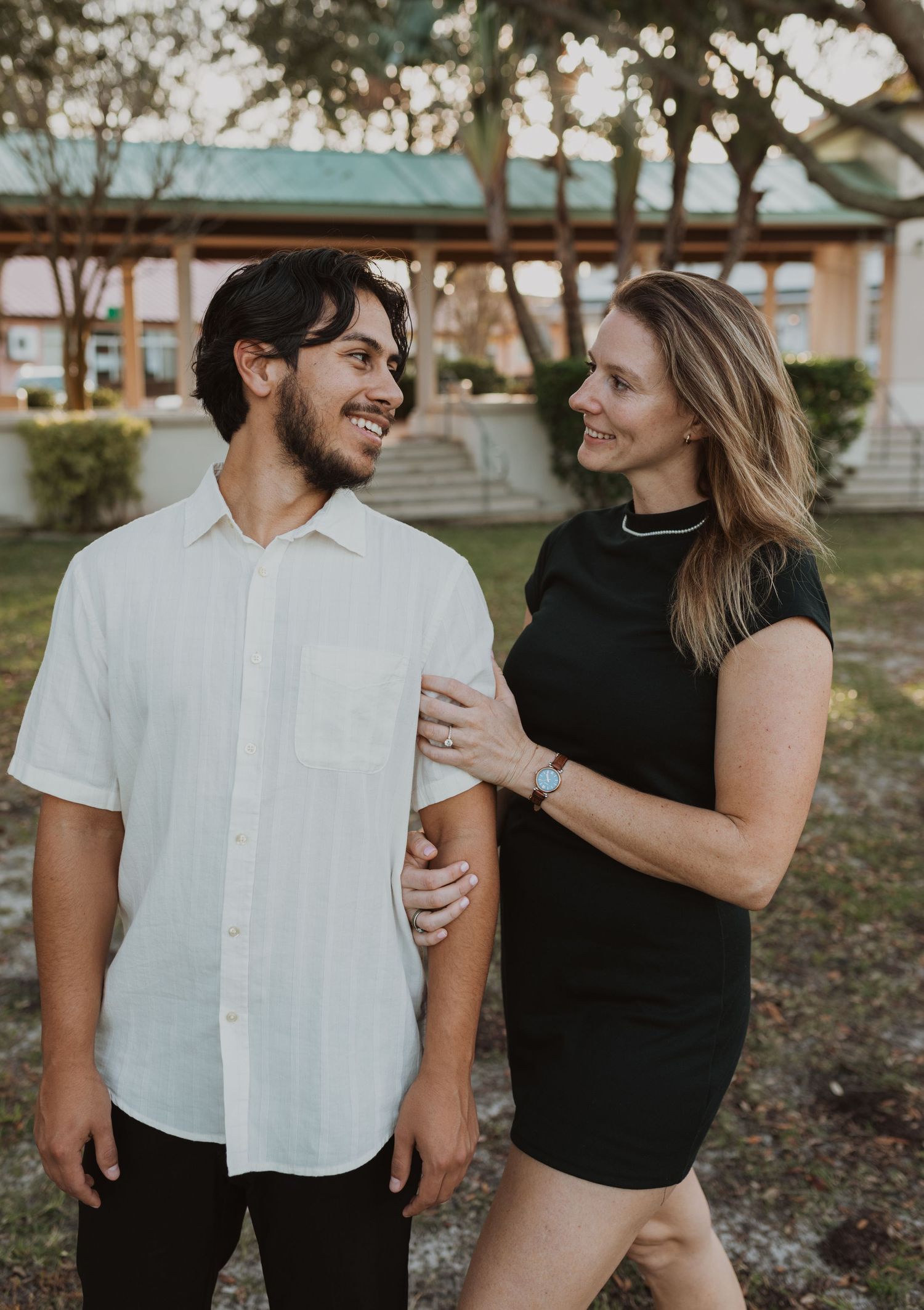 Orlando luxury wedding photographer cute couple smiling at each other.