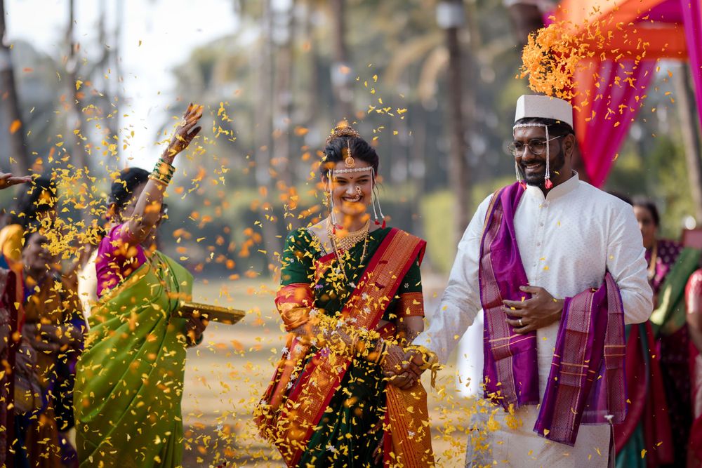 A beautiful Maharashtrian ritual of walking 7 steps together with showering of flower Petals.