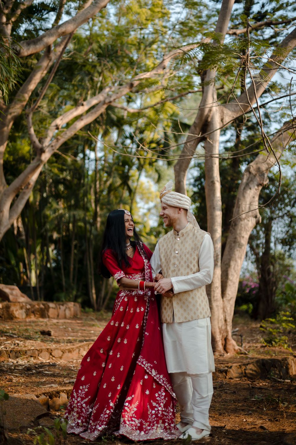 Candid wedding shoot of couple at sunset in Pune hills
