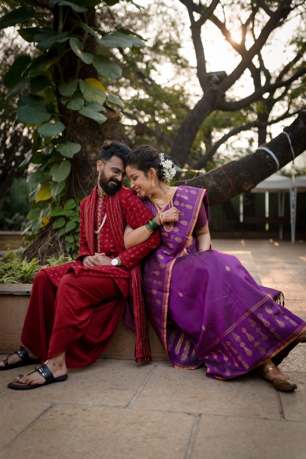 Modern Indian bride and groom smiling during golden hour portrait session in Pune