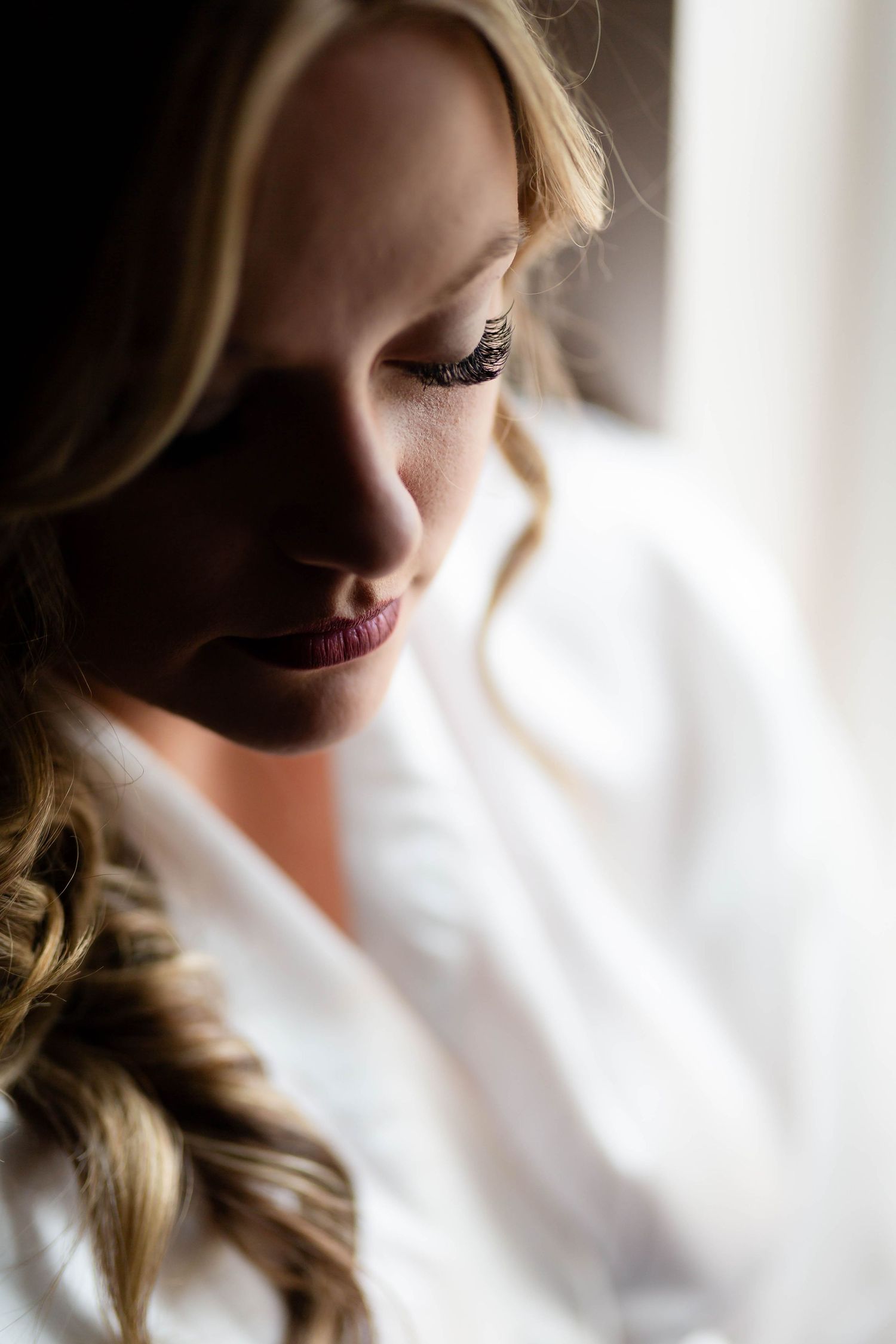 Bride during her getting-ready moments before an outdoor barn wedding in Arkansas