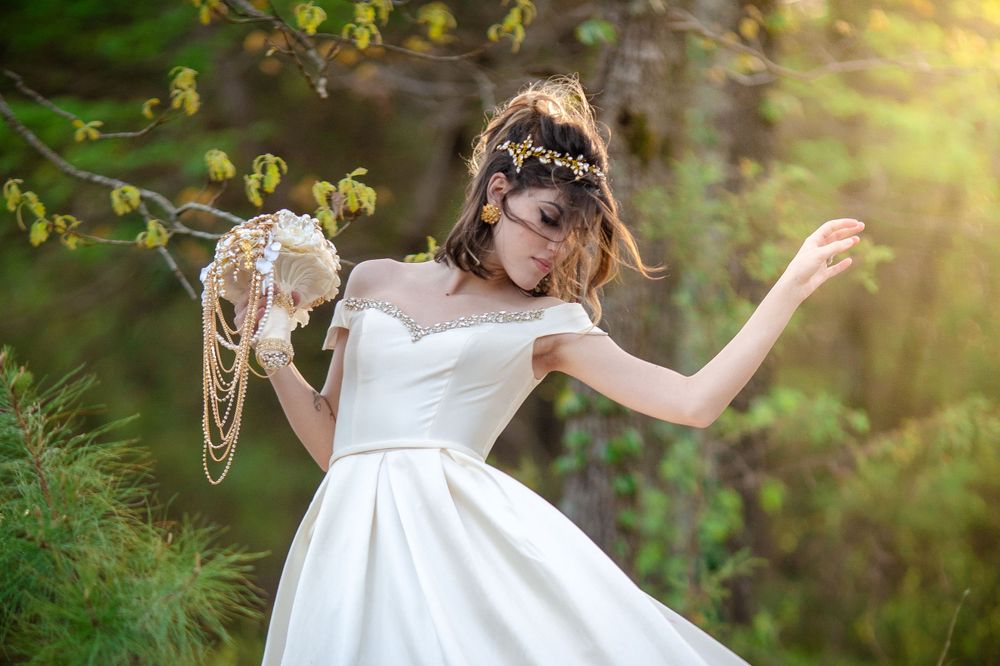 Bride in her gown at Bluebird Estate, an outdoor wedding venue in Mount Pleasant, Arkansas