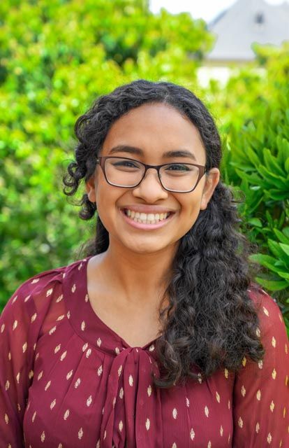 informal headshot outdoors