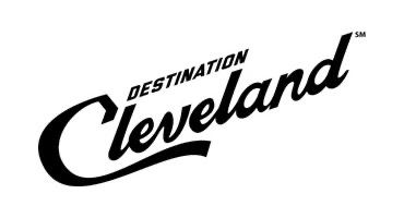 Black and white retro-style logo reading 'Destination Cleveland' in cursive font.