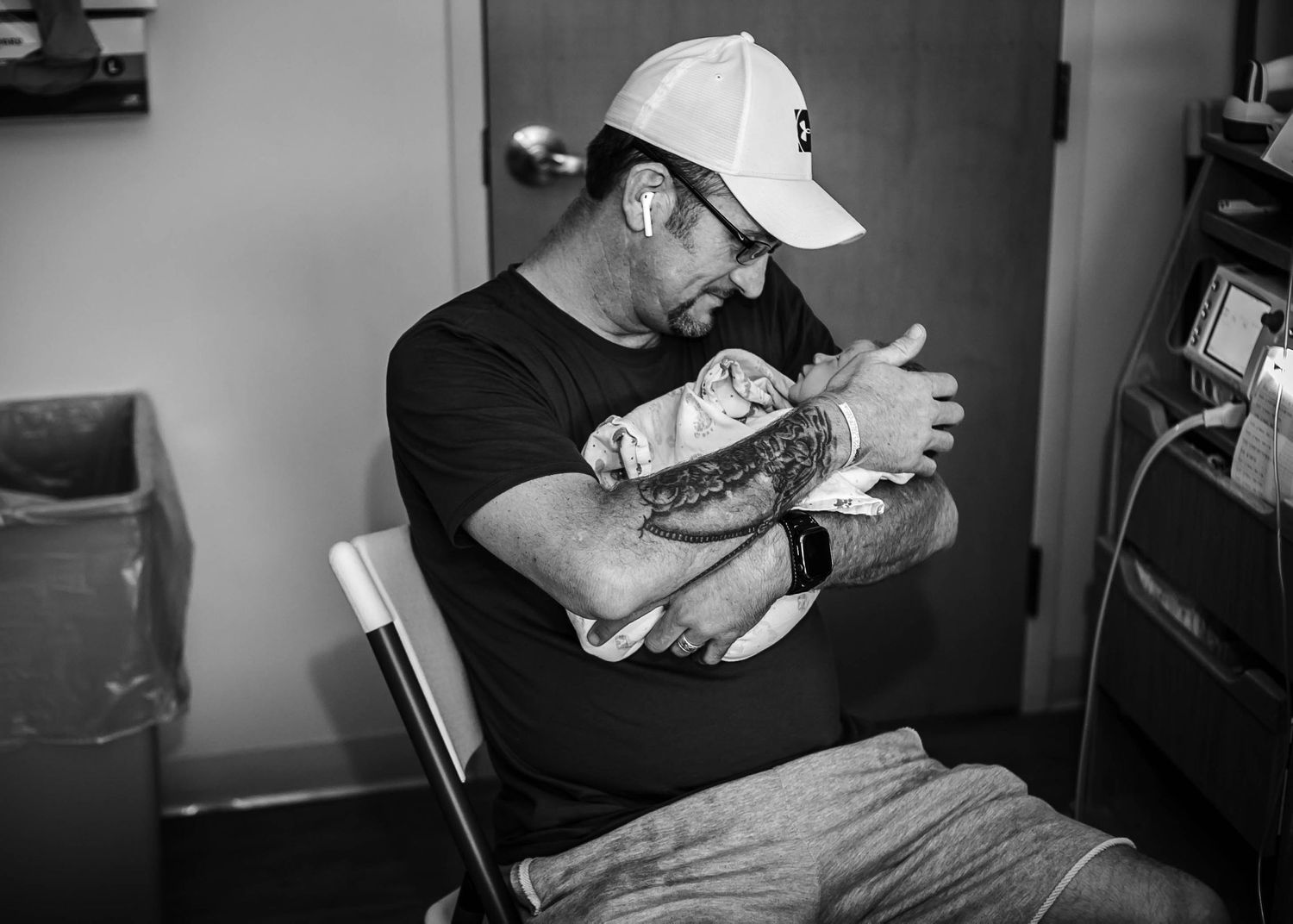 A dad holding his son just after birth at UnityPoint Health in Sioux City, IA.