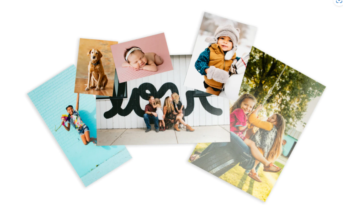 Collection of printed family photos arranged with a decorative black bow on a light background.