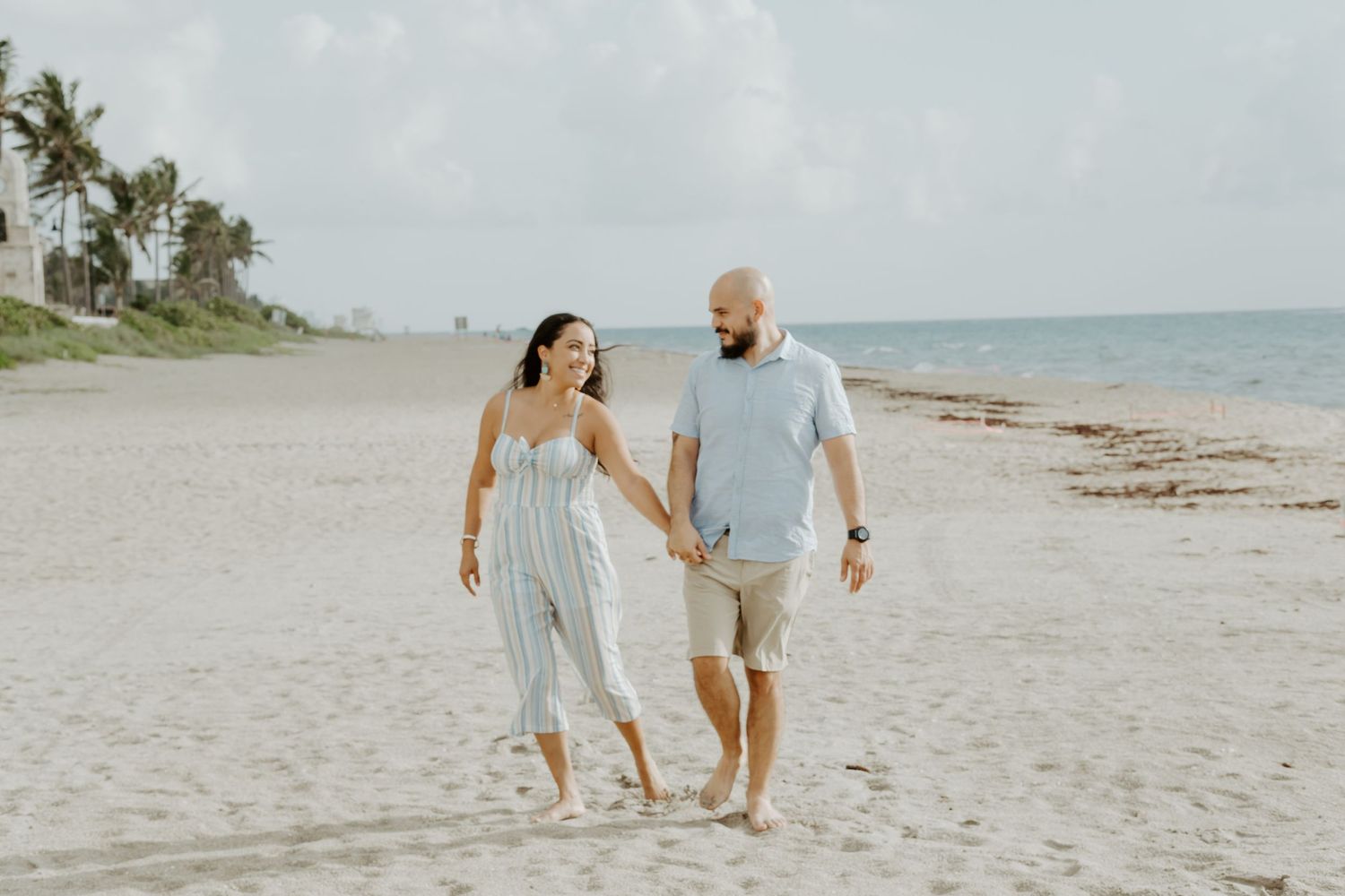 A couple at Palm Beach Florida dancing at sunrise