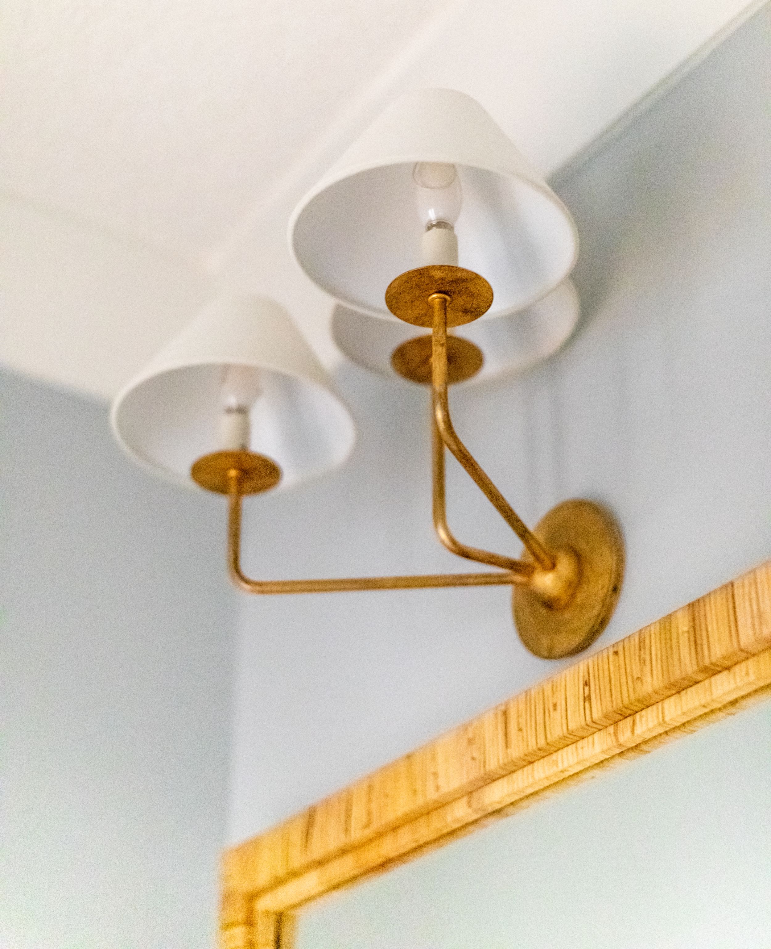 Visual Comfort lighting in coastal, traditional bathroom