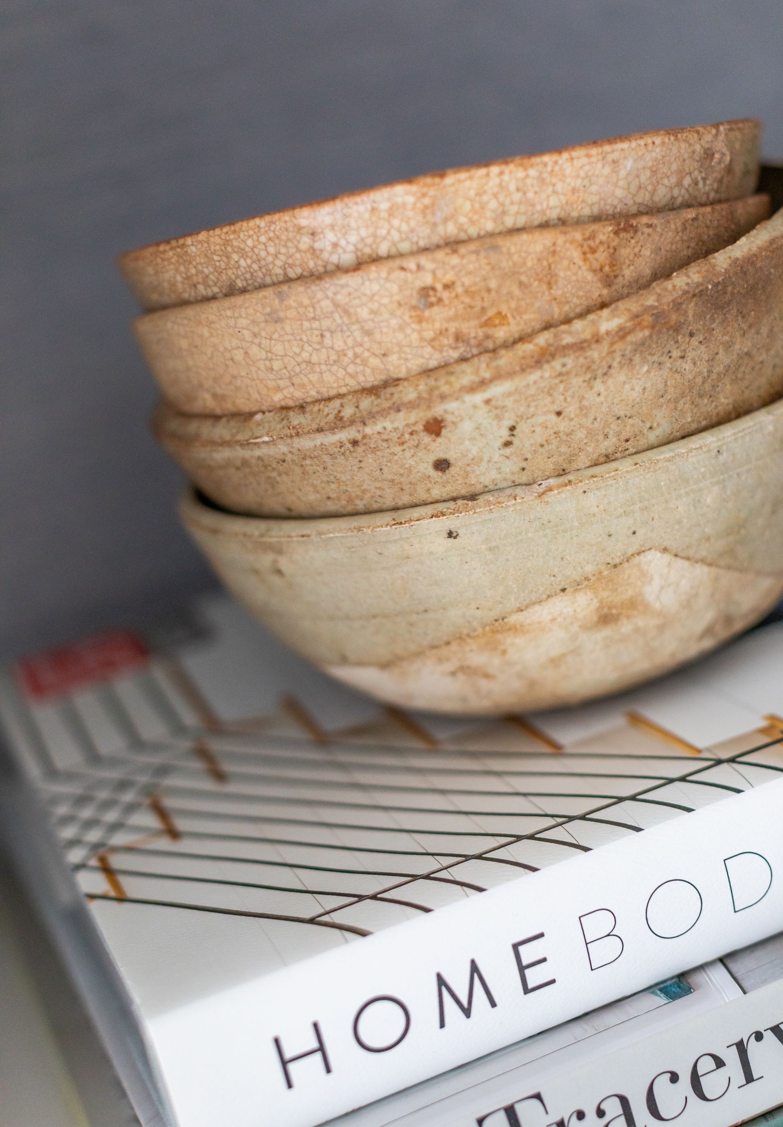 Antique bowls and coffee table books